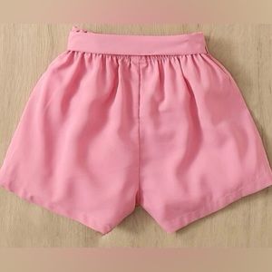 Pink belted shorts